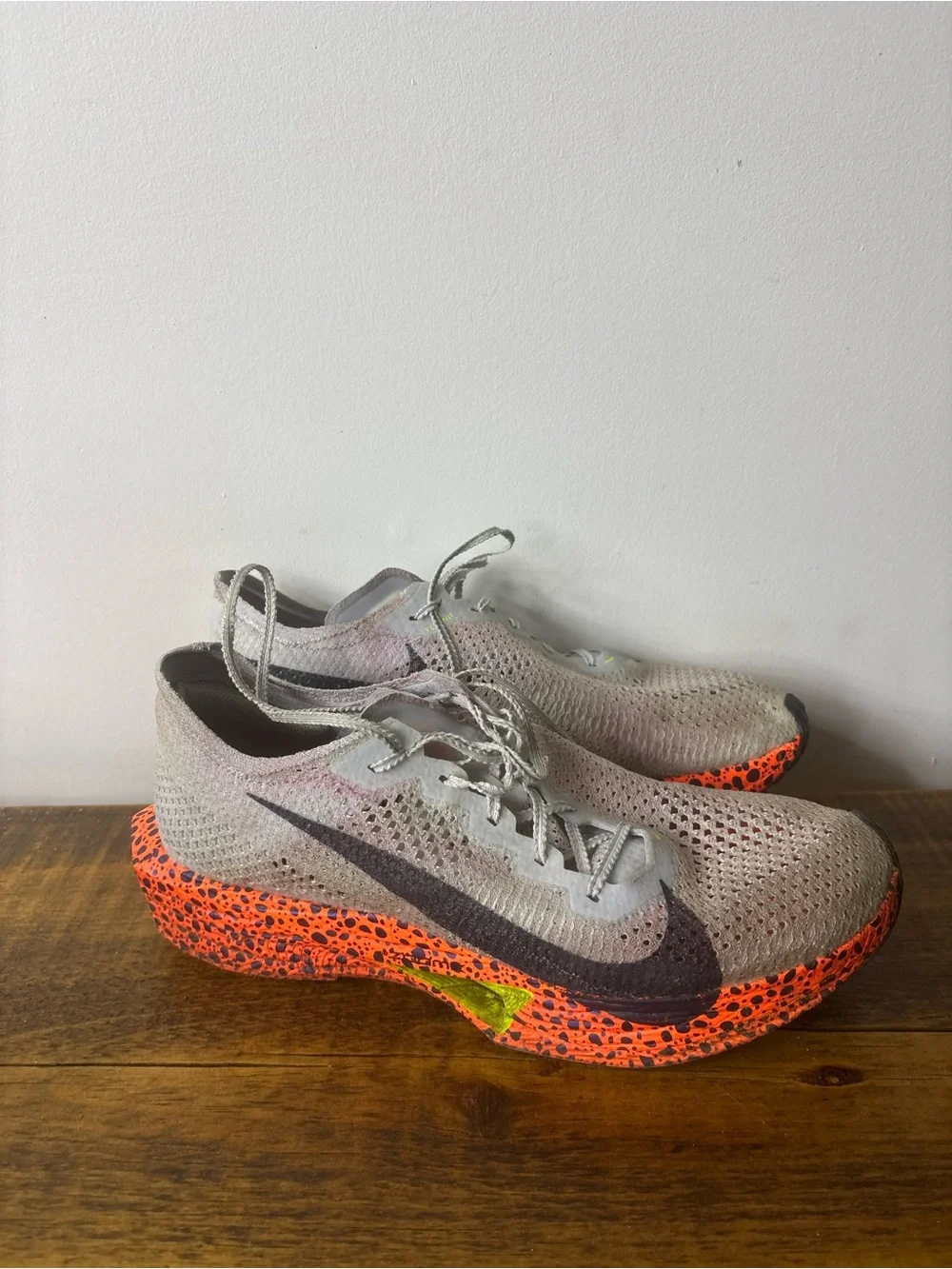 Nike Grey Flyknit Shoes with Orange Speckled Midsole